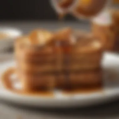 Rich Syrup Drizzle on Baileys French Toast A close-up view of Baileys French toast being drizzled with a rich syrup.