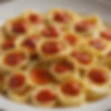 A close-up view showcasing the layers of tortellini and sauce baked to perfection.