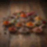 A variety of spices used in barbecue seasoning displayed on a rustic wooden table.