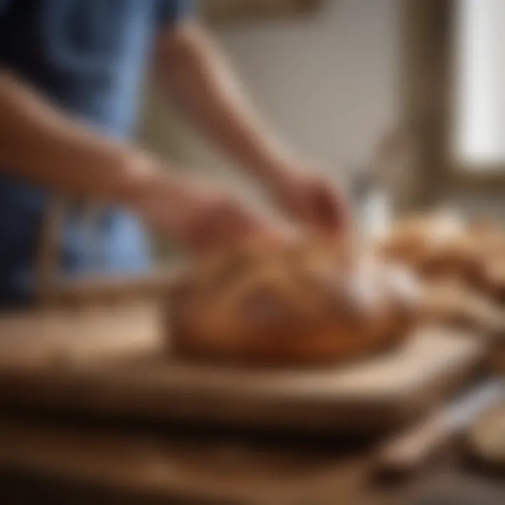 An individual enjoying freshly cut slices of bread on a rustic kitchen table.