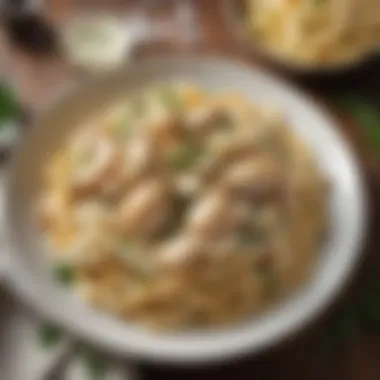 A bowl of creamy Chicken Alfredo pasta garnished with parsley