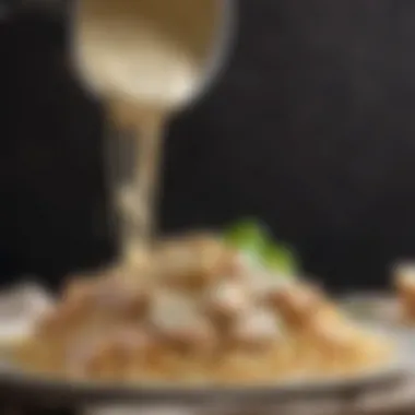 Close-up of Chicken Alfredo sauce pouring onto pasta