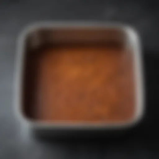 Elegant square metal baking pan showcasing its polished finish