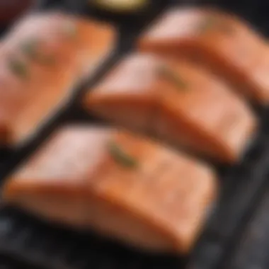 A close-up of salmon steaks on a grill with smoky flavor