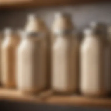 Homemade Oat Milk Storage Storage jars filled with homemade oat milk on a kitchen shelf