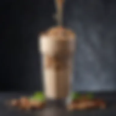 A close-up of a protein shake topped with nuts and seeds, served in an elegant glass