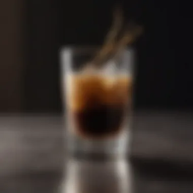 Elegant glass showcasing shaken espresso with ice