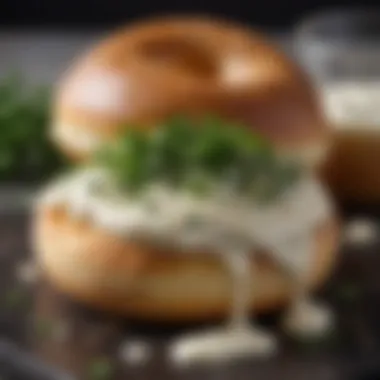 A delicious bagel topped with cream cheese and fresh herbs