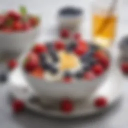A bowl of fat-free Greek yogurt topped with fresh berries and honey