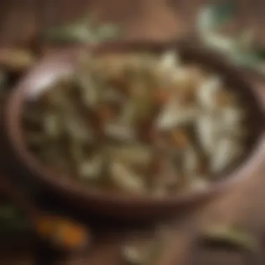 Dried bay leaves and spices in a rustic bowl