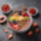 A vibrant smoothie bowl topped with fresh fruits and seeds