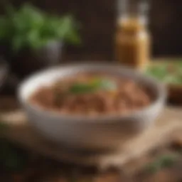 A vibrant bowl of slow-cooked beans with herbs and spices.