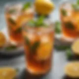 A refreshing glass of iced tea showcased with fresh mint leaves and citrus slices