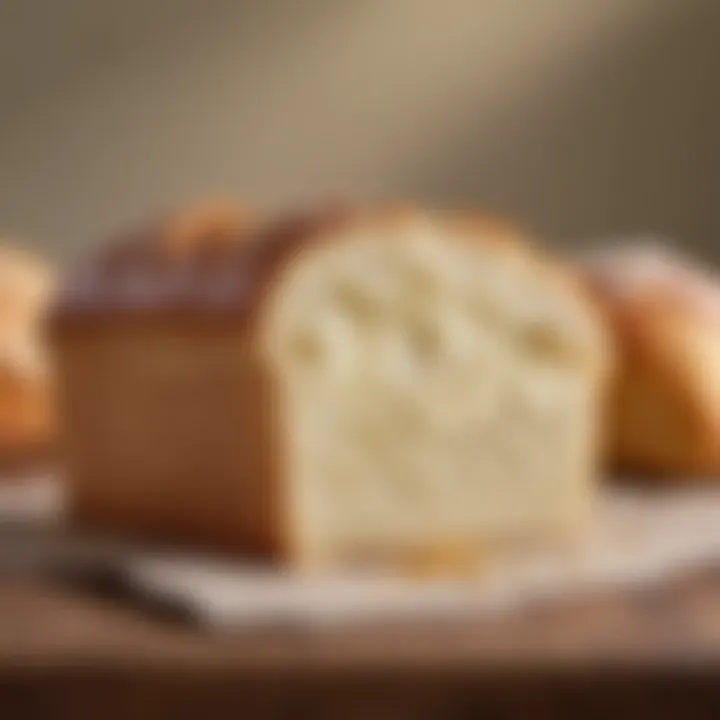 A slice of warm bread with butter melting on top against a cozy background