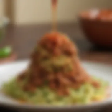 A vibrant plate of zucchini noodles topped with a savory meat sauce, representing low carb indulgence.