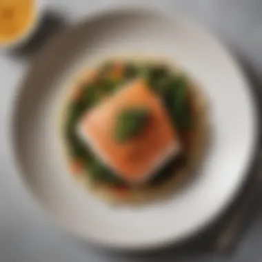 Elegant Presentation of Pesco Meal A beautifully arranged plate showcasing a fish dish with a side of quinoa and greens.