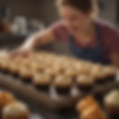 A satisfied customer unboxing a delivery of cupcakes at home.