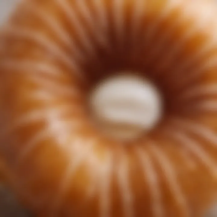 Close-up of a doughnut cruller with a crispy exterior and soft, airy interior, highlighting its texture.