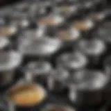 Glistening stainless steel pots arranged neatly