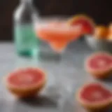 A vibrant grapefruit margarita garnished with a slice of grapefruit and a salted rim