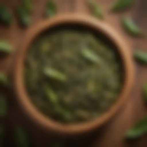 A variety of green tea leaves in an elegant wooden bowl showcasing the diversity of flavors.