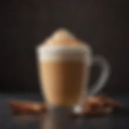 A close-up view of a Honey Cinnamon Latte topped with frothy milk and a sprinkle of cinnamon