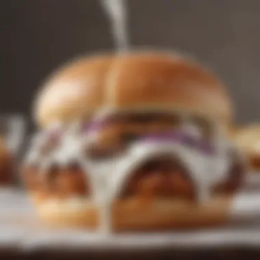A close-up of a bite taken out of a White Castle-style burger, highlighting juicy flavor.