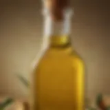 A close-up view of cold-pressed olive oil in a glass bottle, showcasing its rich golden hue.
