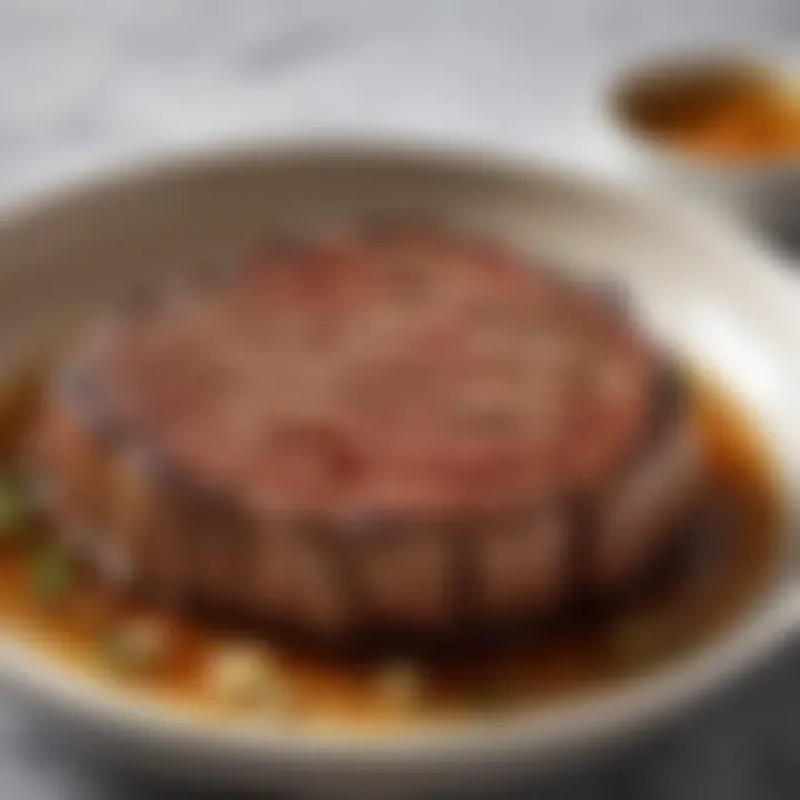 A close-up view of a ribeye steak marinating in a bowl