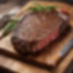 A perfectly grilled medium rare steak resting on a wooden cutting board