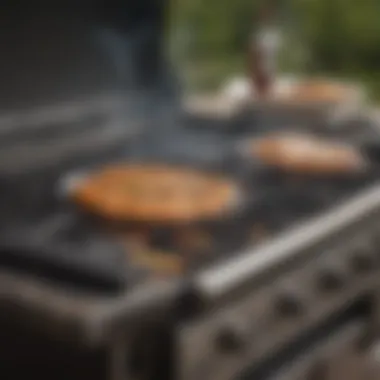 A side burner in action with a simmering sauce beside a grill