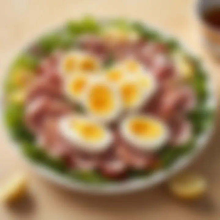 Sliced boiled eggs atop a colorful tuna salad mix