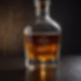 Aged Anejo Tequila in a crystal glass on a dark wooden table.