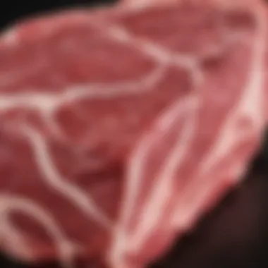 Close-up of marbled beef highlighting its quality.