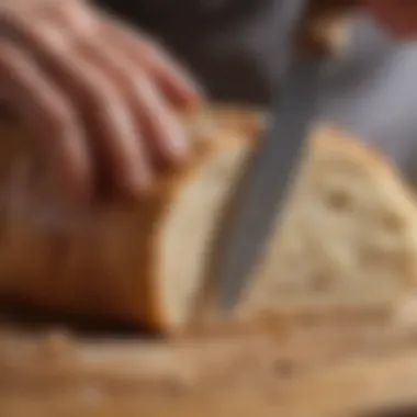 Precision Slicing of Artisanal Bread Close-up of a bread knife slicing artisanal bread
