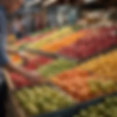 A close-up of a person selecting fruits from a market stall.