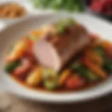 A beautifully plated pork dish with vibrant vegetables