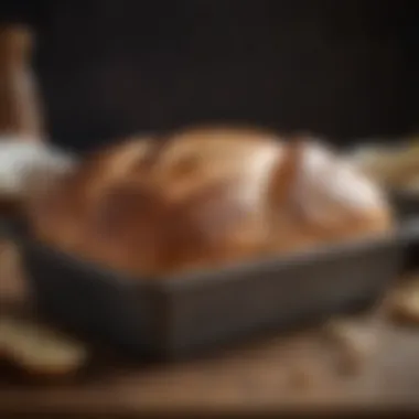 Freshly baked artisan bread in a stone loaf pan