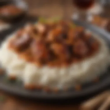 Bourbon chicken dish served on a plate with rice