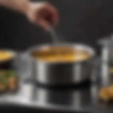 The Art of Craftsmanship in Heavy Bottom Saucepan A heavy bottom stainless steel saucepan showcasing its polished exterior and thick base.