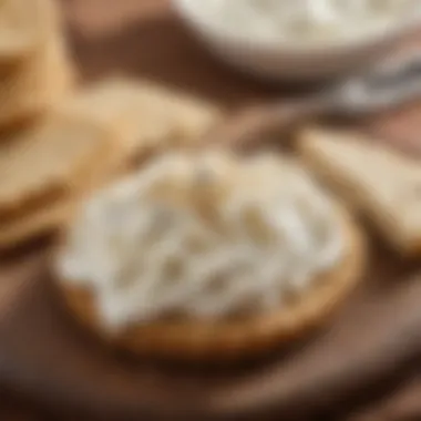 A close-up of sugar-free cream cheese spread on a whole grain cracker