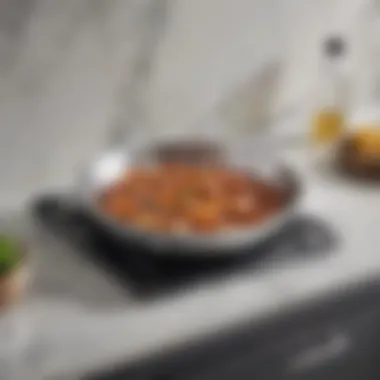 Elegant All-Clad 12-inch fry pan on a marble countertop