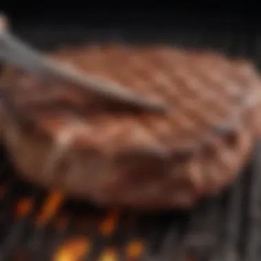 Close-up of high-quality meat tongs gripping a perfectly seared steak on a grill.